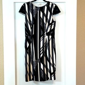 Brand new Cache knee length dress w/faux leather cap sleeves